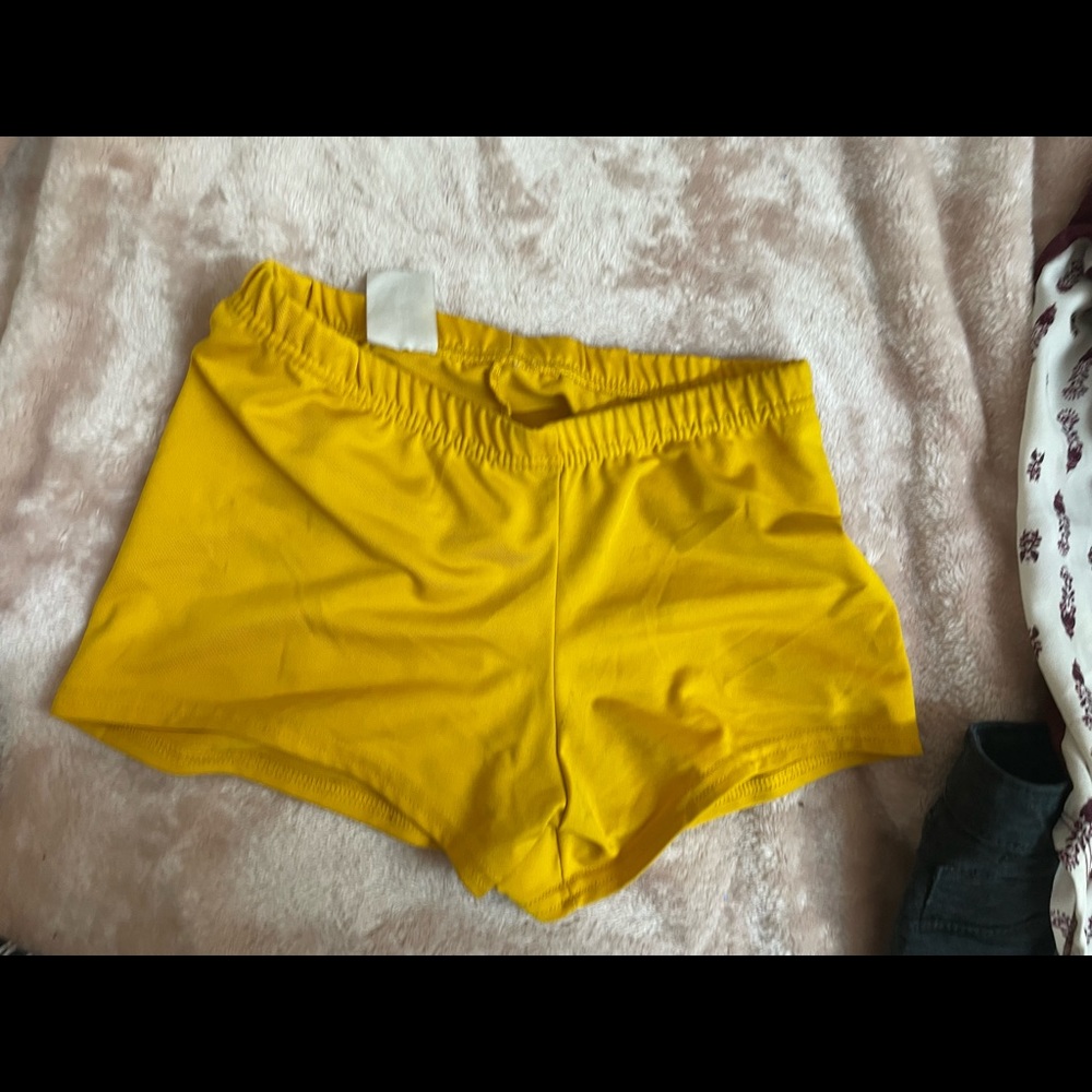 Yellow stretchy workout shorts
